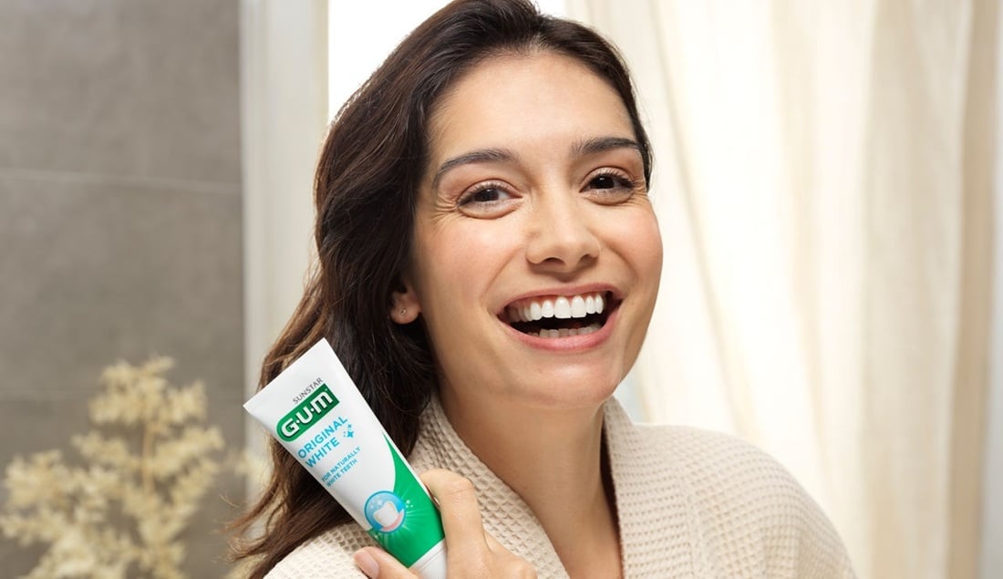 Sunstar GUM Original White Toothpaste with lady smiling lifestyle image